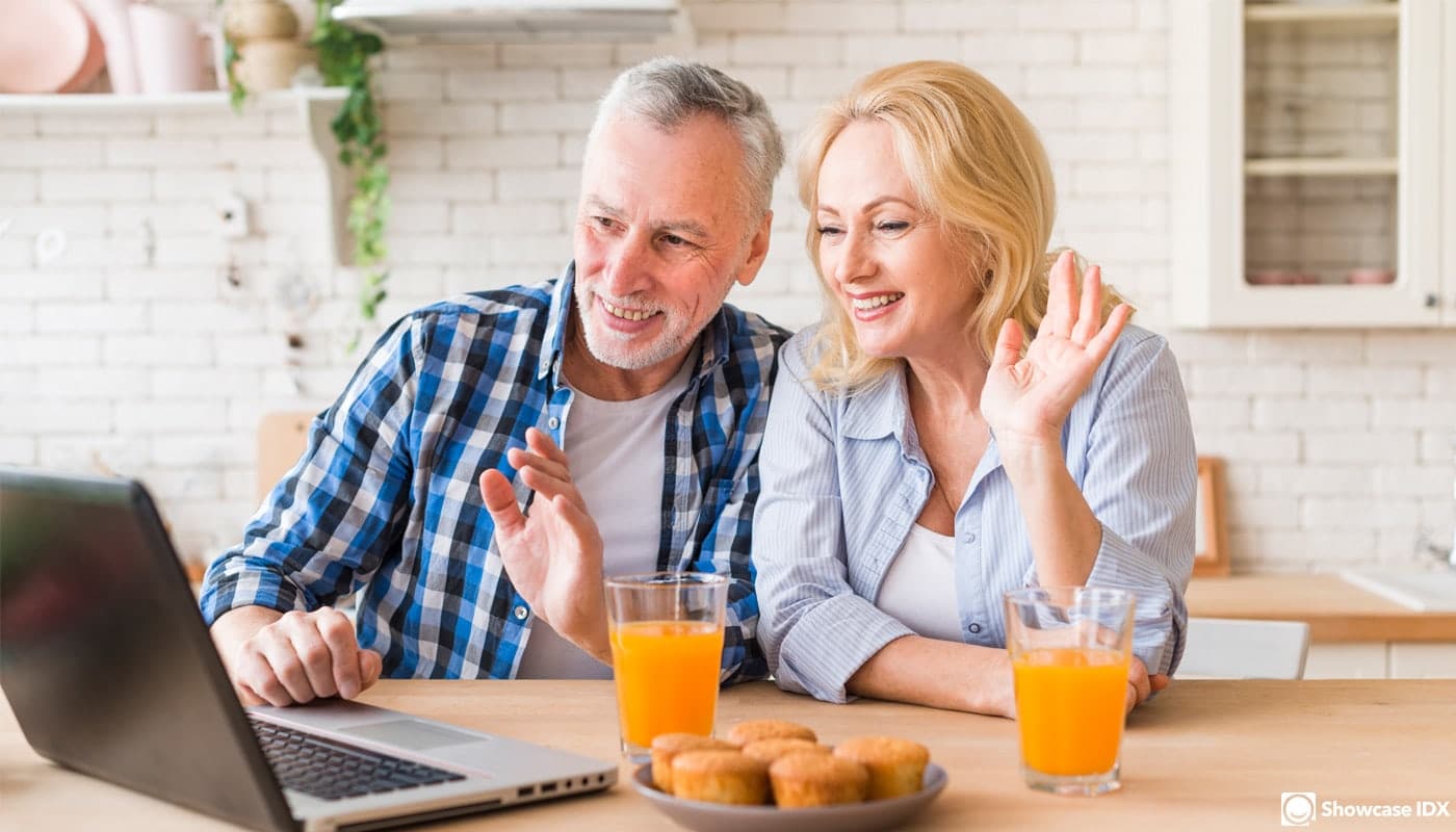 Couple doing real estate virtual tour with Realtor via real estate website